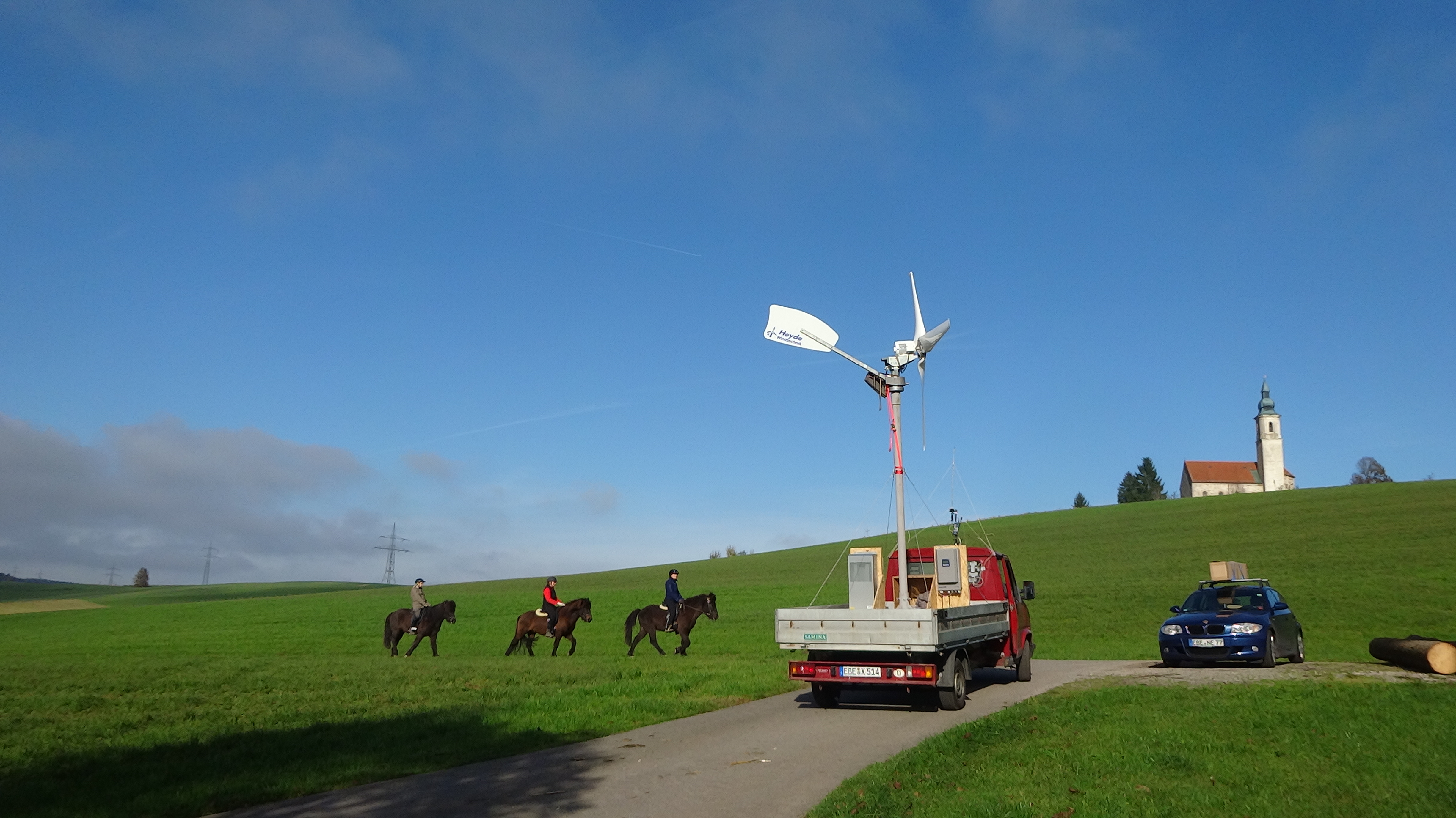 Mobile measurement rig — flatbed truck with small wind turbine